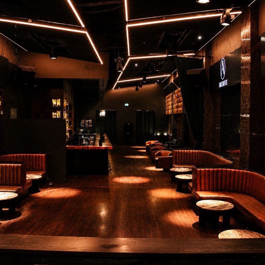 Archive Sacramento's main floor with curved banquettes and low tables